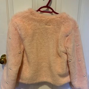 pink fluffy coat